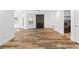 Bright living room with wood-look flooring, fireplace, and modern finishes at 356 Clark Dr, Henderson, NV 89074
