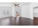 Spacious main bedroom with ceiling fan, plantation shutters, and ensuite bath and walk-in closet at 356 Clark Dr, Henderson, NV 89074