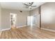 Bedroom with wood floors, neutral paint, and easy access to bathroom at 368 Legacy Dr, Henderson, NV 89014