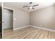 Neutral bedroom features new flooring, fresh paint, fan and closet at 368 Legacy Dr, Henderson, NV 89014
