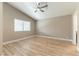 Spacious bedroom with neutral paint, wood floors and ample natural light at 368 Legacy Dr, Henderson, NV 89014