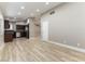 Bright kitchen featuring stainless appliances and wood-look flooring at 368 Legacy Dr, Henderson, NV 89014