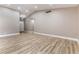 Bright living room featuring wood-look flooring and neutral paint at 368 Legacy Dr, Henderson, NV 89014