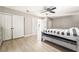 Spacious bedroom with walk-in closet and light wood flooring at 3695 Funston Way, Las Vegas, NV 89129