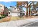 Charming two-story home with a two-car garage and well-maintained front yard landscaping at 3695 Funston Way, Las Vegas, NV 89129