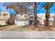 Charming two-story home with a two-car garage and well-maintained front yard landscaping at 3695 Funston Way, Las Vegas, NV 89129