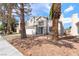 Charming two-story home with a two-car garage and well-maintained front yard landscaping at 3695 Funston Way, Las Vegas, NV 89129