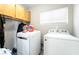 Practical laundry room with washer, dryer, and storage cabinets for convenience at 3695 Funston Way, Las Vegas, NV 89129