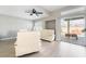 Cozy living room with a sliding glass door to backyard views at 3695 Funston Way, Las Vegas, NV 89129