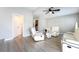 Comfortable living room with contemporary furnishings and bright, neutral colors at 3695 Funston Way, Las Vegas, NV 89129