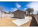 A view of the backyard with concrete patio and gravel at 3800 Summer Breeze Cir, Las Vegas, NV 89108