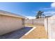 Spacious backyard with gravel landscaping and concrete patio at 3800 Summer Breeze Cir, Las Vegas, NV 89108