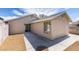 Exterior shot of the backyard featuring concrete patio and easy to care for landscaping at 3800 Summer Breeze Cir, Las Vegas, NV 89108