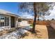 Spacious backyard with a low-maintenance desert landscape and a view of the mountains at 3800 Summer Breeze Cir, Las Vegas, NV 89108