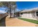 Spacious backyard with a low-maintenance desert landscape and a view of the mountains at 3800 Summer Breeze Cir, Las Vegas, NV 89108
