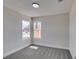 Bedroom with carpet and natural light from two windows at 3800 Summer Breeze Cir, Las Vegas, NV 89108