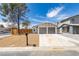 Charming home with a two-car garage and a low-maintenance front yard at 3800 Summer Breeze Cir, Las Vegas, NV 89108