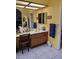 Bright bathroom with a sink, vanity, and ample counter space at 3987 Saddlewood Ct, Las Vegas, NV 89121