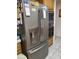 This kitchen features a stainless fridge with a water and ice dispenser at 3987 Saddlewood Ct, Las Vegas, NV 89121