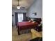 Bedroom features carpet flooring, a ceiling fan and neutral colored walls at 3987 Saddlewood Ct, Las Vegas, NV 89121