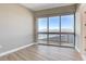 Bedroom with hardwood floors and large windows offering expansive city views at 4471 Dean Martin Dr # 4001, Las Vegas, NV 89103