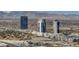 Panoramic city view highlighting the hotel towers and mountain backdrop in a sprawling urban setting at 4471 Dean Martin Dr # 4001, Las Vegas, NV 89103