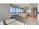 Bright kitchen with stainless steel appliances, center island, and a wall of windows with views at 4471 Dean Martin Dr # 4001, Las Vegas, NV 89103