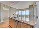 Modern kitchen with granite counters, stainless steel appliances, and city views at 4471 Dean Martin Dr # 4001, Las Vegas, NV 89103
