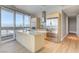 Spacious kitchen featuring an island with seating, stainless steel appliances, and scenic city views at 4471 Dean Martin Dr # 4001, Las Vegas, NV 89103