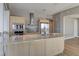 Kitchen featuring an island with bar seating, stainless steel appliances, and scenic city views at 4471 Dean Martin Dr # 4001, Las Vegas, NV 89103