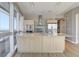 Kitchen featuring an island with seating, stainless steel appliances, and scenic city views at 4471 Dean Martin Dr # 4001, Las Vegas, NV 89103