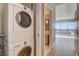 Hallway featuring stackable washer and dryer and view of bathroom and windows overlooking the city at 4471 Dean Martin Dr # 4001, Las Vegas, NV 89103