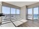 Bright living room with floor-to-ceiling windows and a sliding glass door to a balcony at 4471 Dean Martin Dr # 4001, Las Vegas, NV 89103