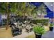 Inviting outdoor seating area with comfortable lounge furniture, lush landscaping, and modern design at 4471 Dean Martin Dr # 4001, Las Vegas, NV 89103