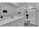 Modern bathroom features a glass-enclosed shower and neutral color palette at 471 Secret Cove Ct, Henderson, NV 89002