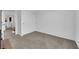 Bedroom featuring carpeted floors, a closet and a hallway at 471 Secret Cove Ct, Henderson, NV 89002