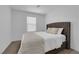 Cozy bedroom with a comfortable bed, neutral colors, and carpeted floors at 471 Secret Cove Ct, Henderson, NV 89002