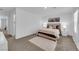 Spacious carpeted main bedroom featuring ample natural light and modern decor at 471 Secret Cove Ct, Henderson, NV 89002