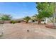 Backyard featuring mature trees and a desert-landscaped yard at 4910 Cielo Ct, Pahrump, NV 89061