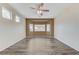 Bright bedroom features wood-look floors, a ceiling fan, and a bay window at 4910 Cielo Ct, Pahrump, NV 89061