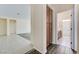 Hallway featuring tile and wood-look flooring with built in cabinets at 4910 Cielo Ct, Pahrump, NV 89061