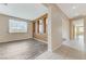 Bright living room features wood-look floors, neutral paint and ample natural light at 4910 Cielo Ct, Pahrump, NV 89061