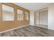 Relaxing living room showcases wood floors, neutral color palette and bright light at 4910 Cielo Ct, Pahrump, NV 89061