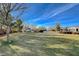 Expansive community park with mature trees and lush green grass at 4910 Cielo Ct, Pahrump, NV 89061