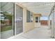 Covered patio featuring a shaded area and a view of the backyard and landscaping, creating a private outdoor oasis at 4910 Cielo Ct, Pahrump, NV 89061