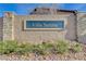 Elegant Villa Serena community sign with stone accents and manicured landscaping at 4910 Cielo Ct, Pahrump, NV 89061