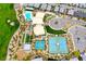 Stunning aerial view of community featuring a pool, tennis courts, bocce ball, and golf course at 4914 E Beacon Ridge Dr, Pahrump, NV 89061