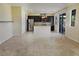 Spacious kitchen with stainless steel appliances, dark wood cabinets, and an island at 4914 E Beacon Ridge Dr, Pahrump, NV 89061