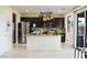 Open concept kitchen with stainless steel appliances, granite countertops, and a kitchen island at 4914 E Beacon Ridge Dr, Pahrump, NV 89061