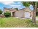 Traditional style home with manicured lawn, attractive curb appeal and a two-car garage at 523 Rancho Del Norte Dr, North Las Vegas, NV 89031